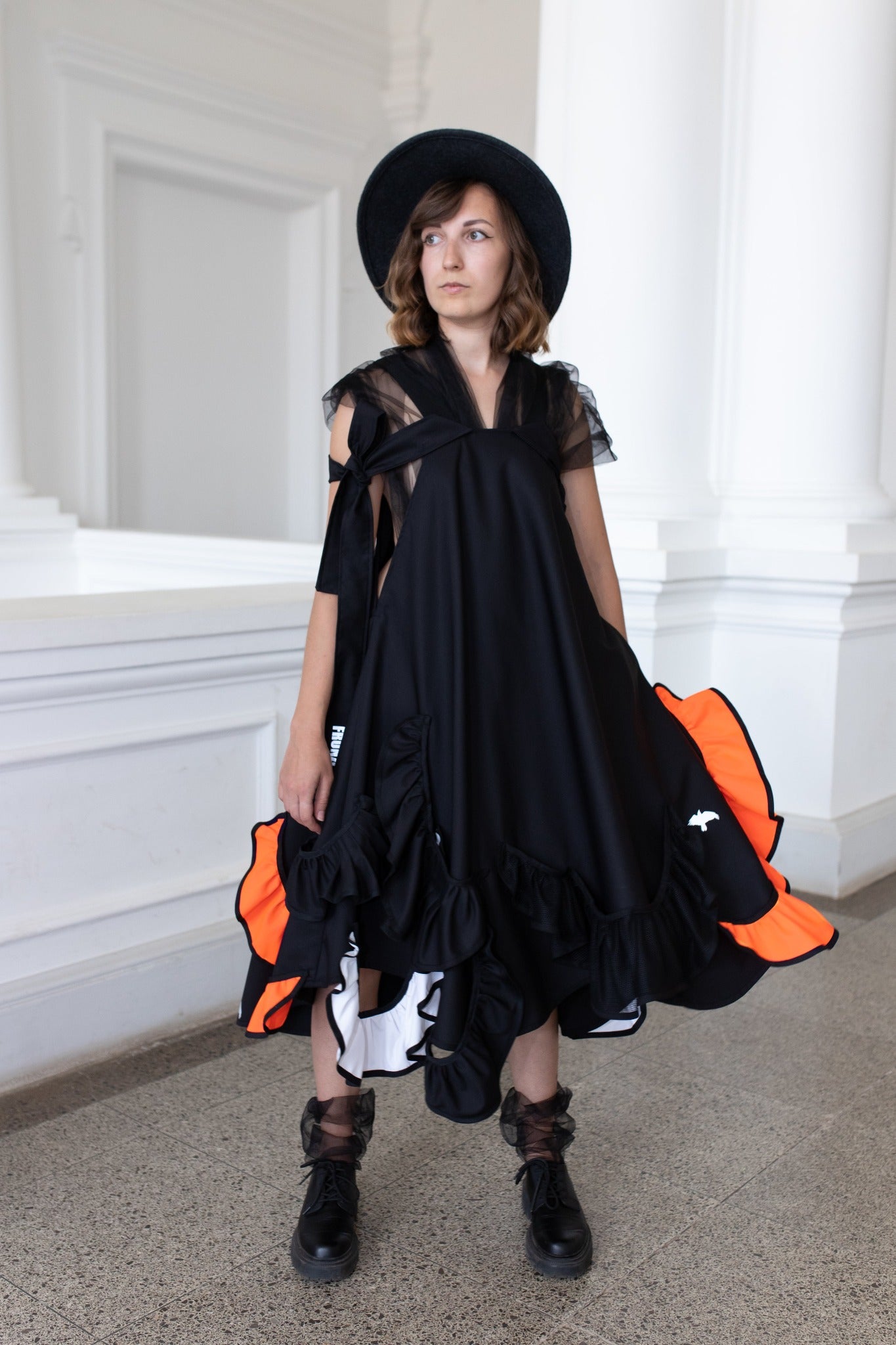 Black fronzi dress with orange and white frills