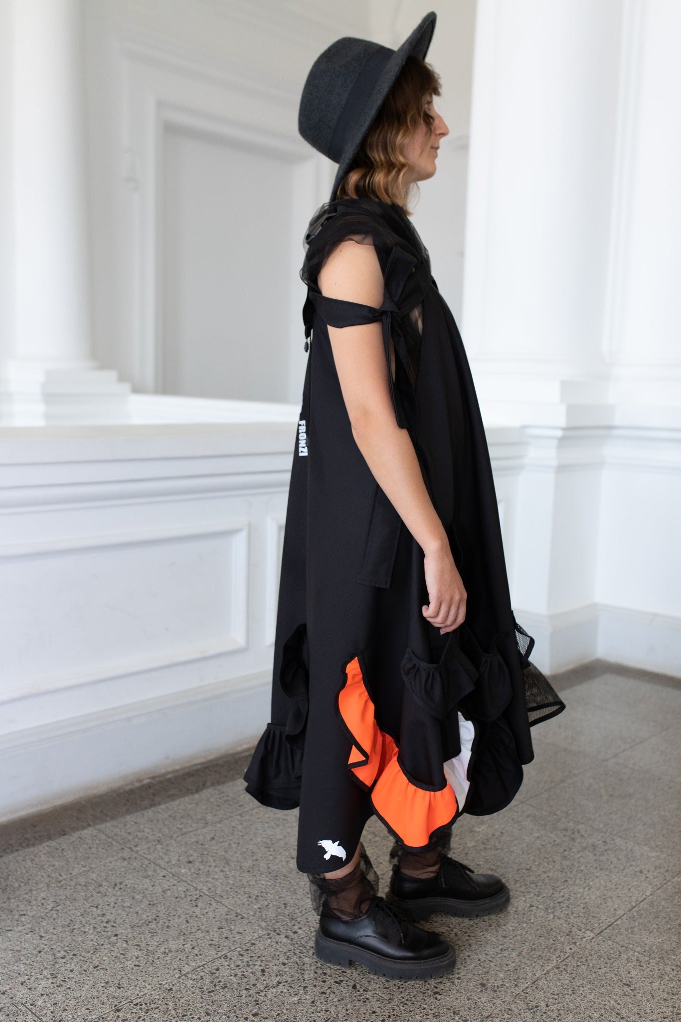 Black fronzi dress with orange and white frills