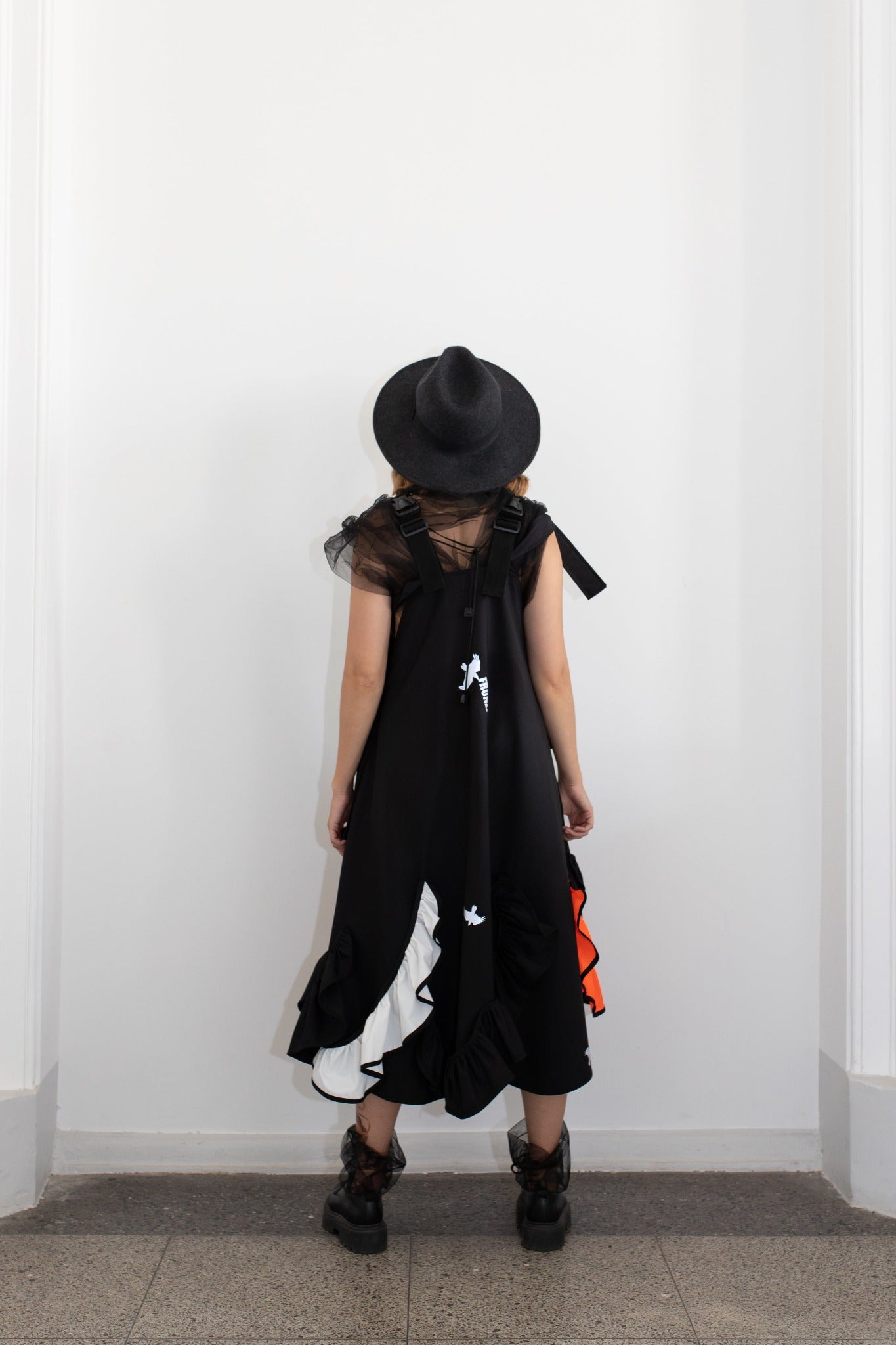 Black fronzi dress with orange and white frills