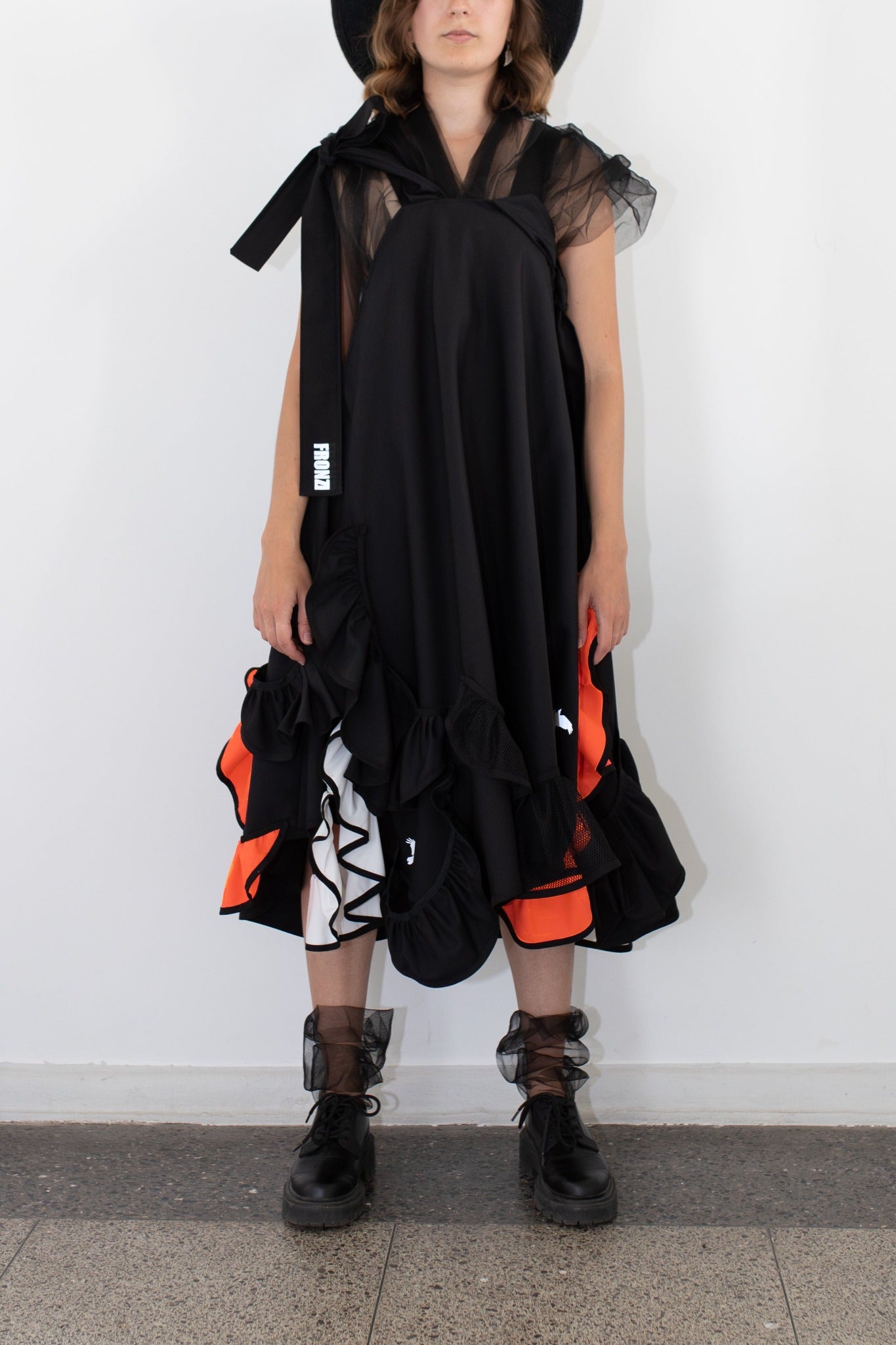 Black fronzi dress with orange and white frills