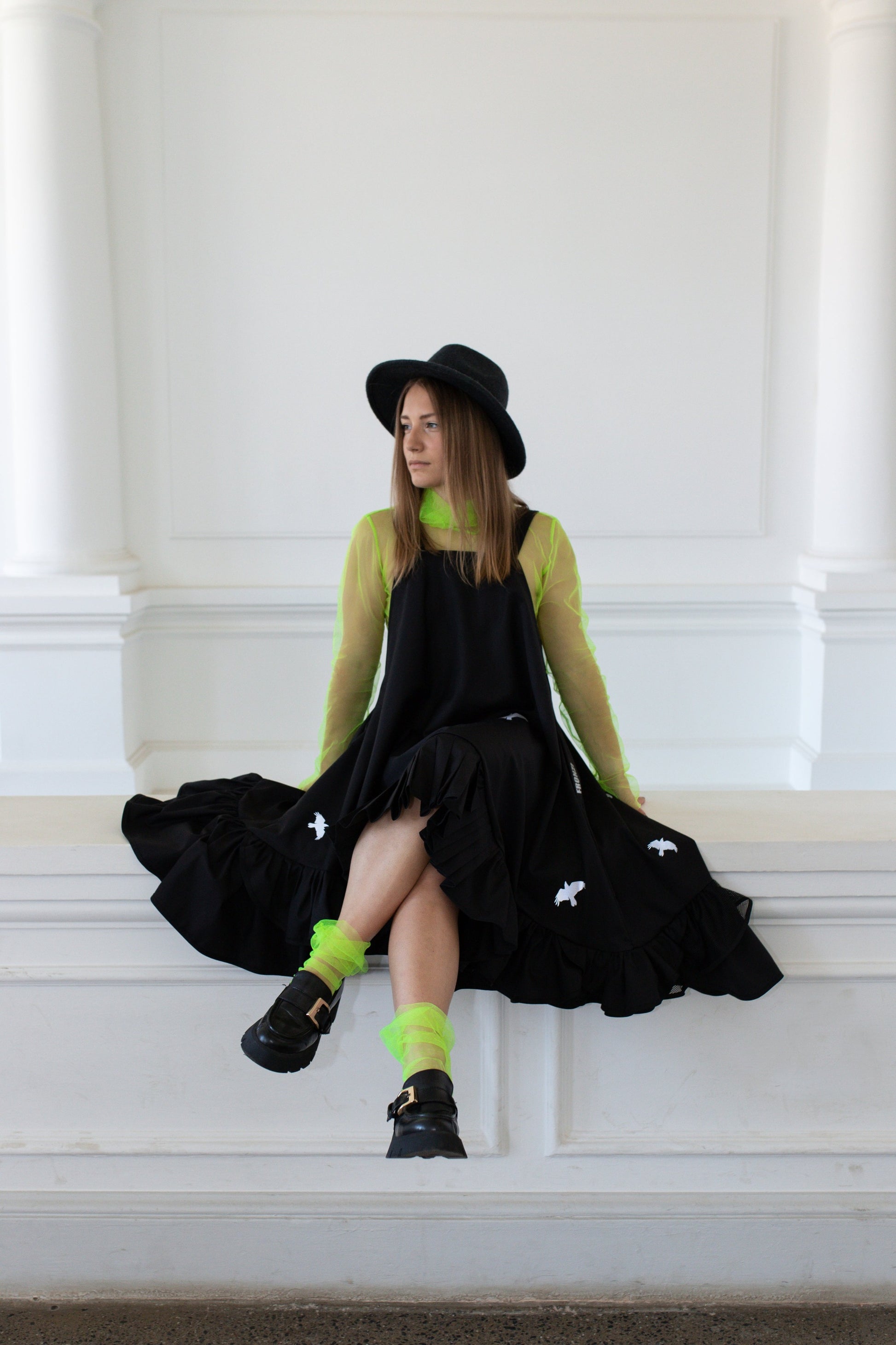 Black fronzi dress with reflective bird details