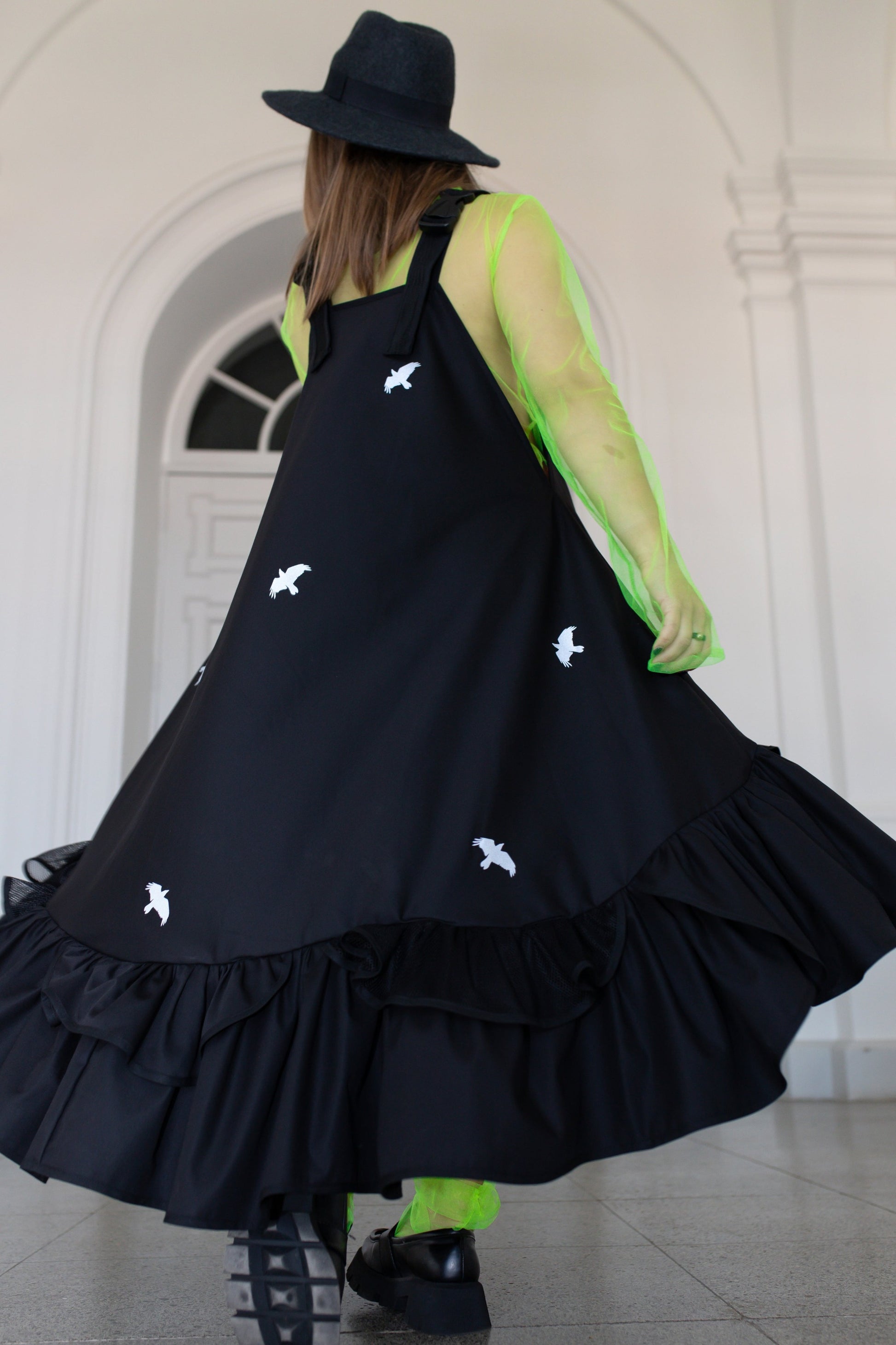 Black fronzi dress with reflective bird details
