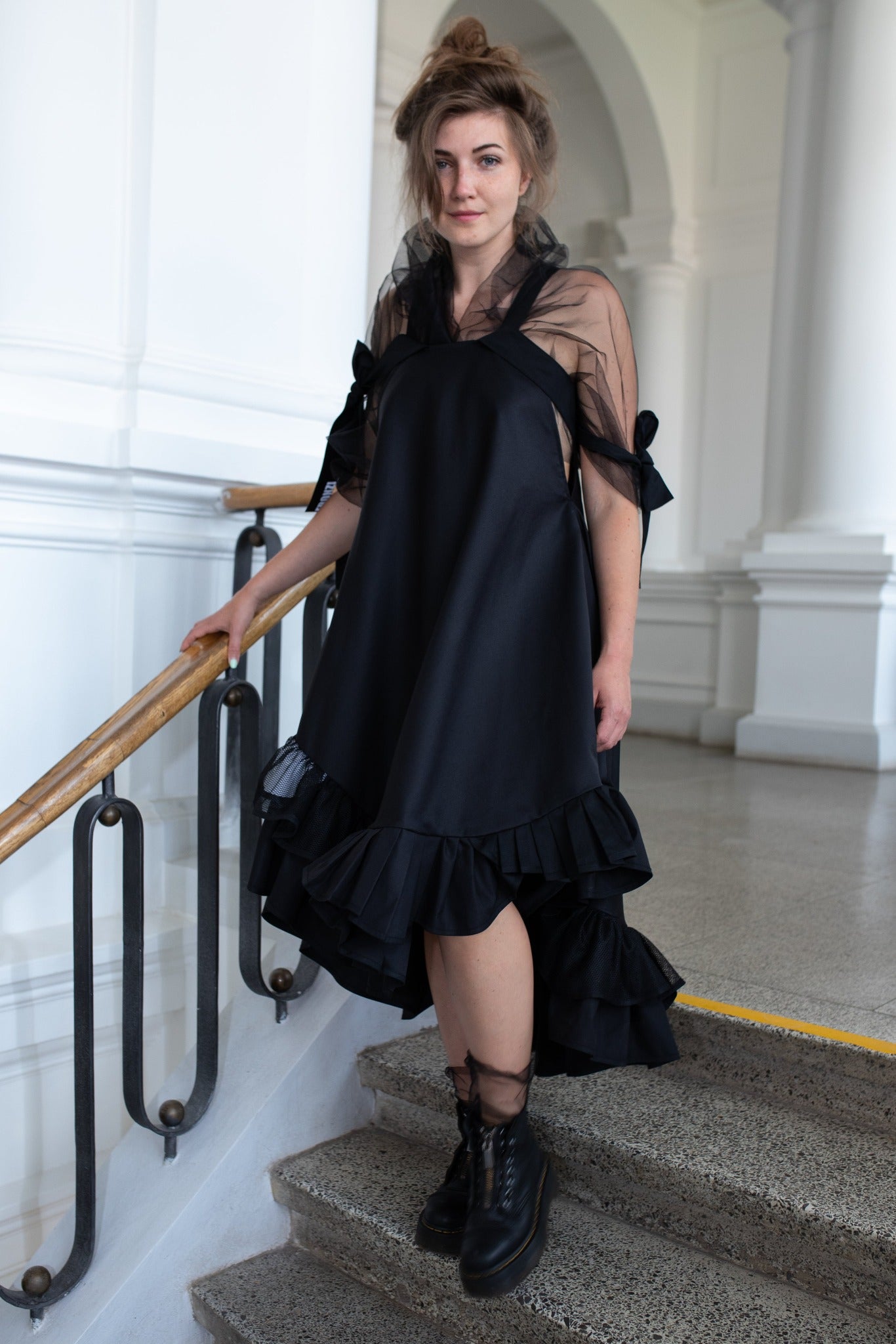 Black fronzi dress with orange details and frills