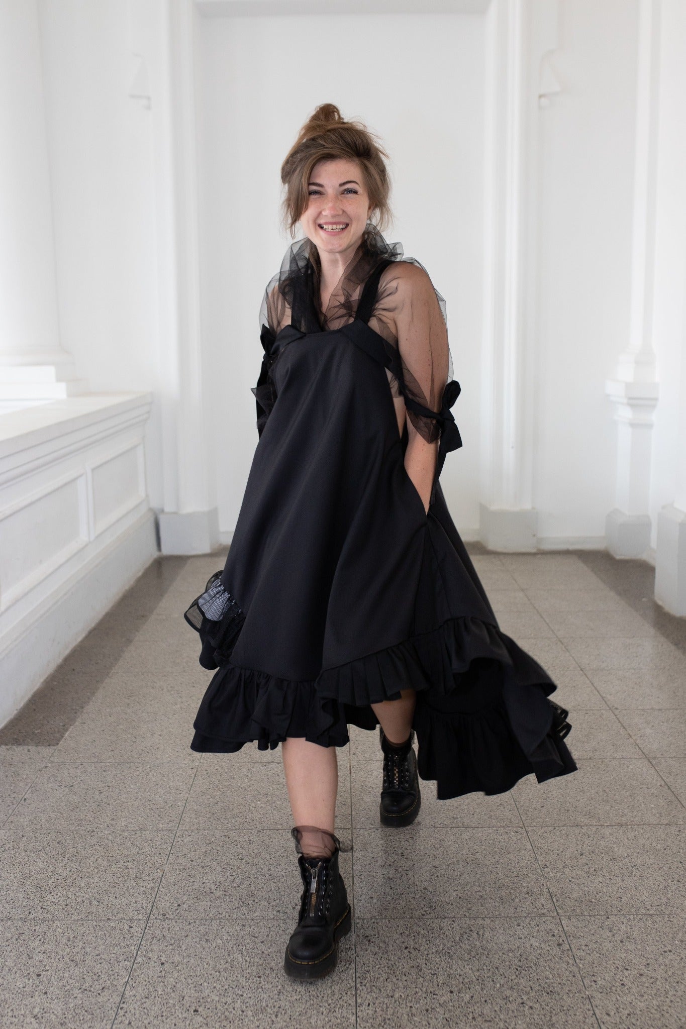 Black fronzi dress with orange details and frills