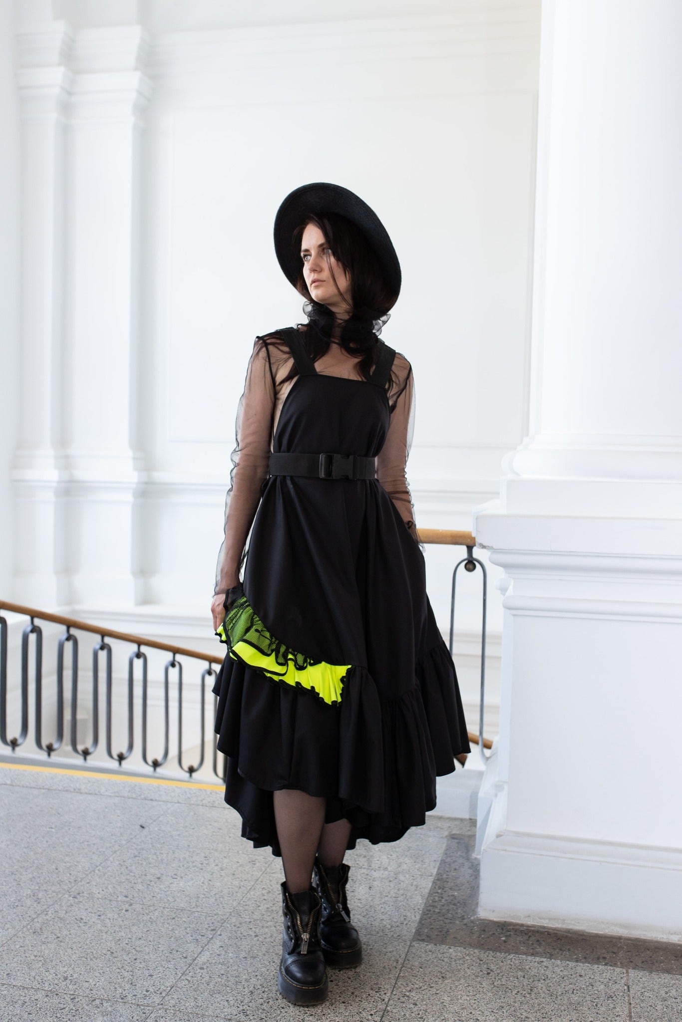 Long, black fronzi dress with neone details and frills