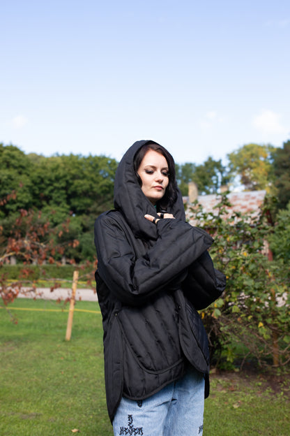 Short quilted coat in black unisex