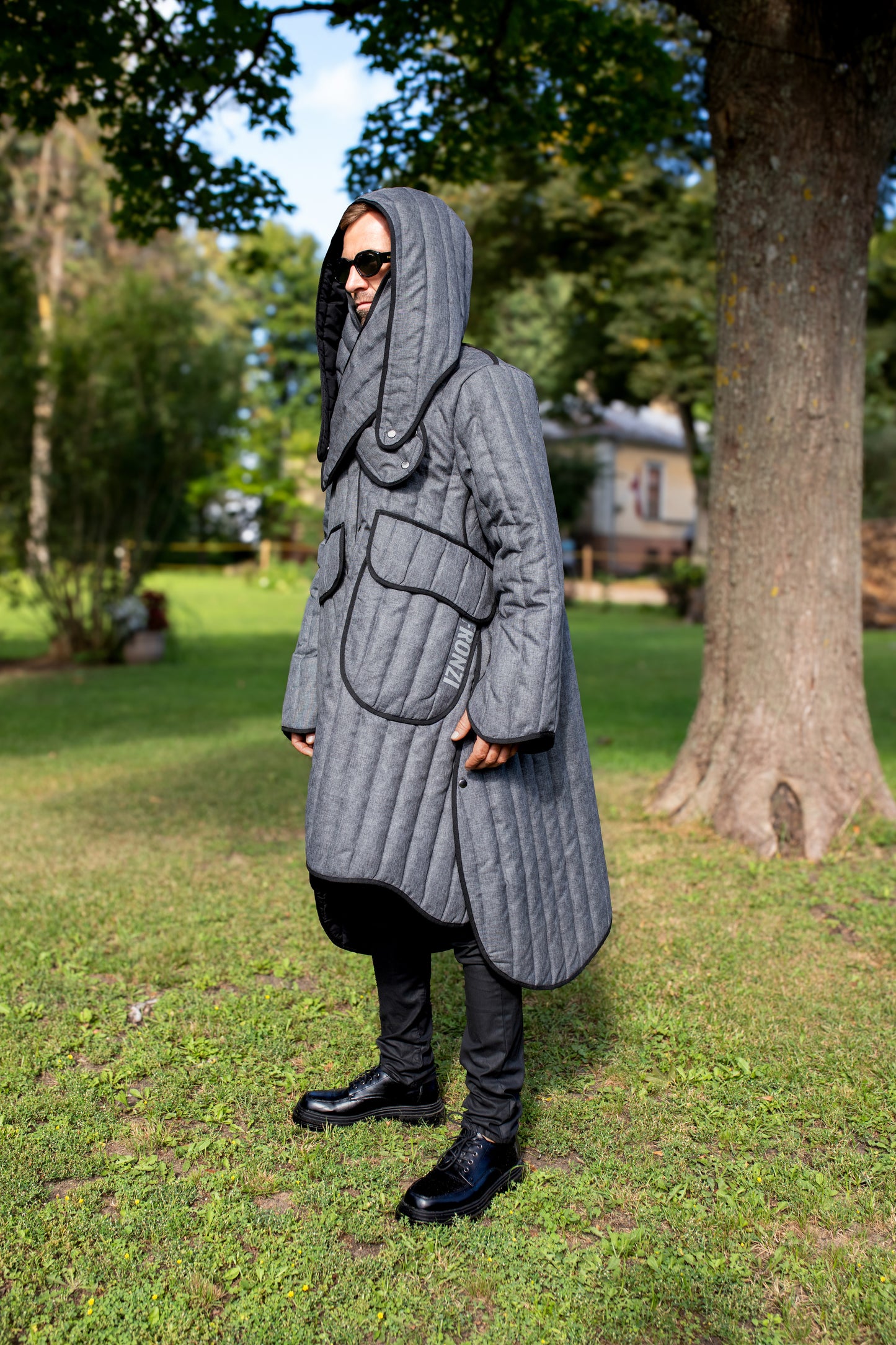 Long quilted coat in grey unisex