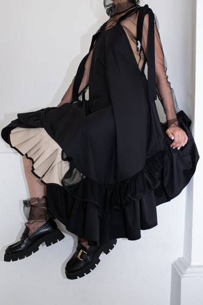 Black fronzi dress with frills and beige detail