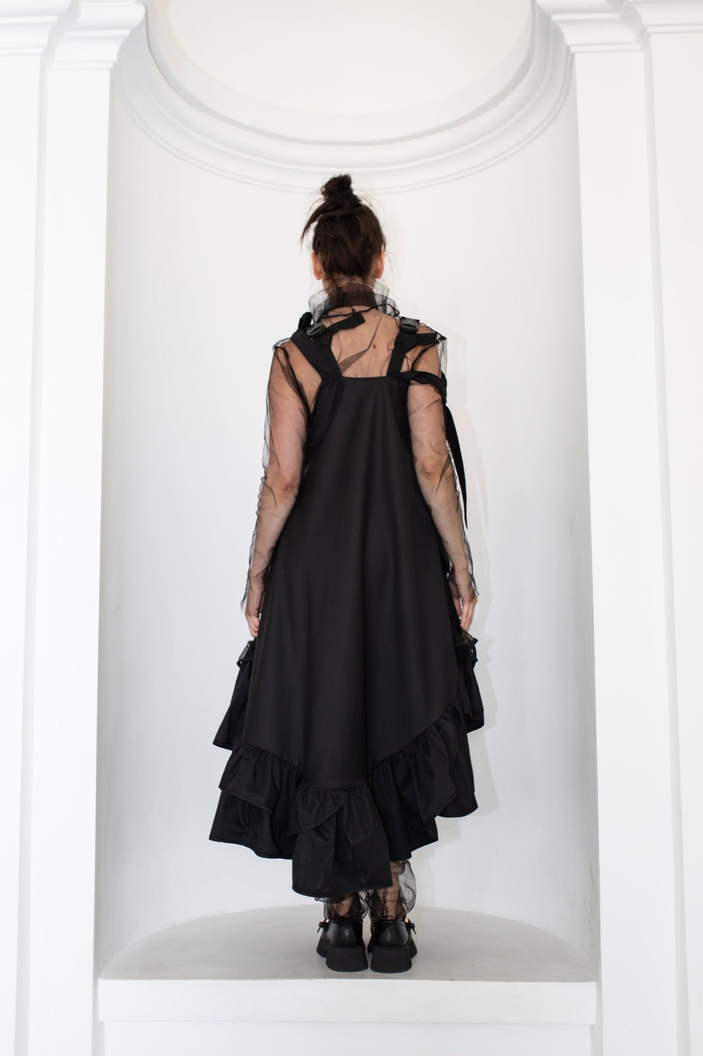 Black fronzi dress with frills and beige detail