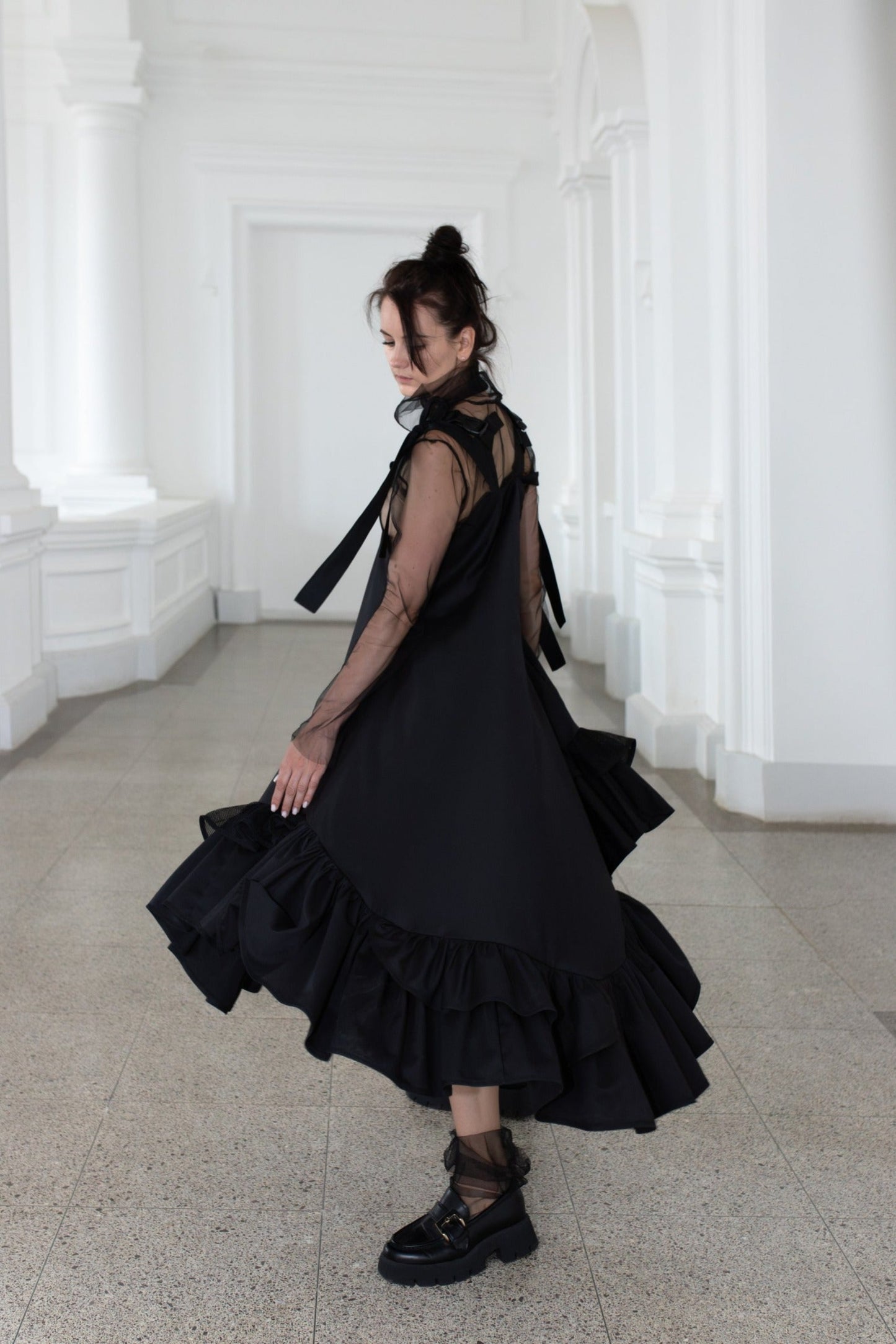 Black fronzi dress with frills and beige detail