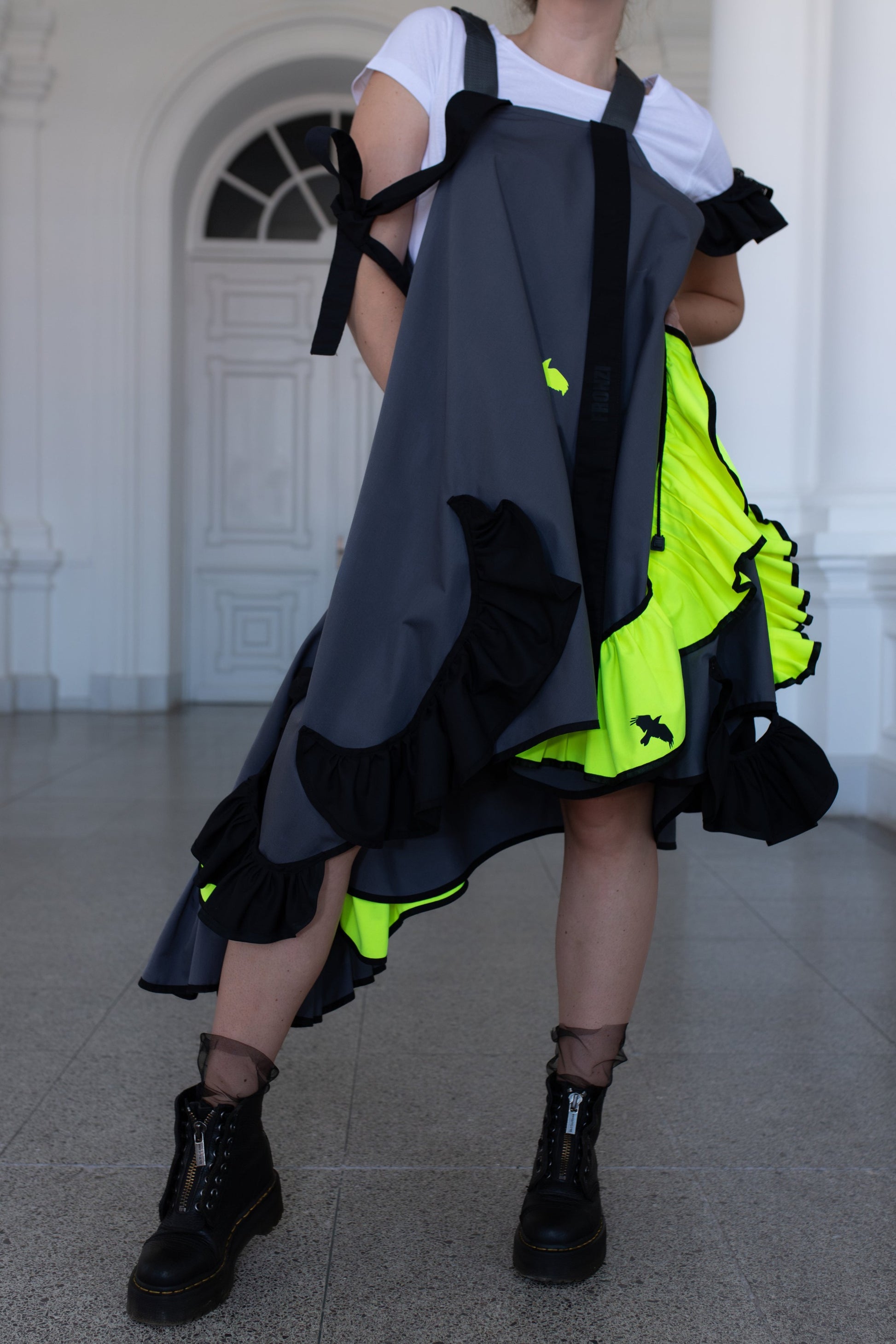 Grey fronzi dress with neon and black details and frills