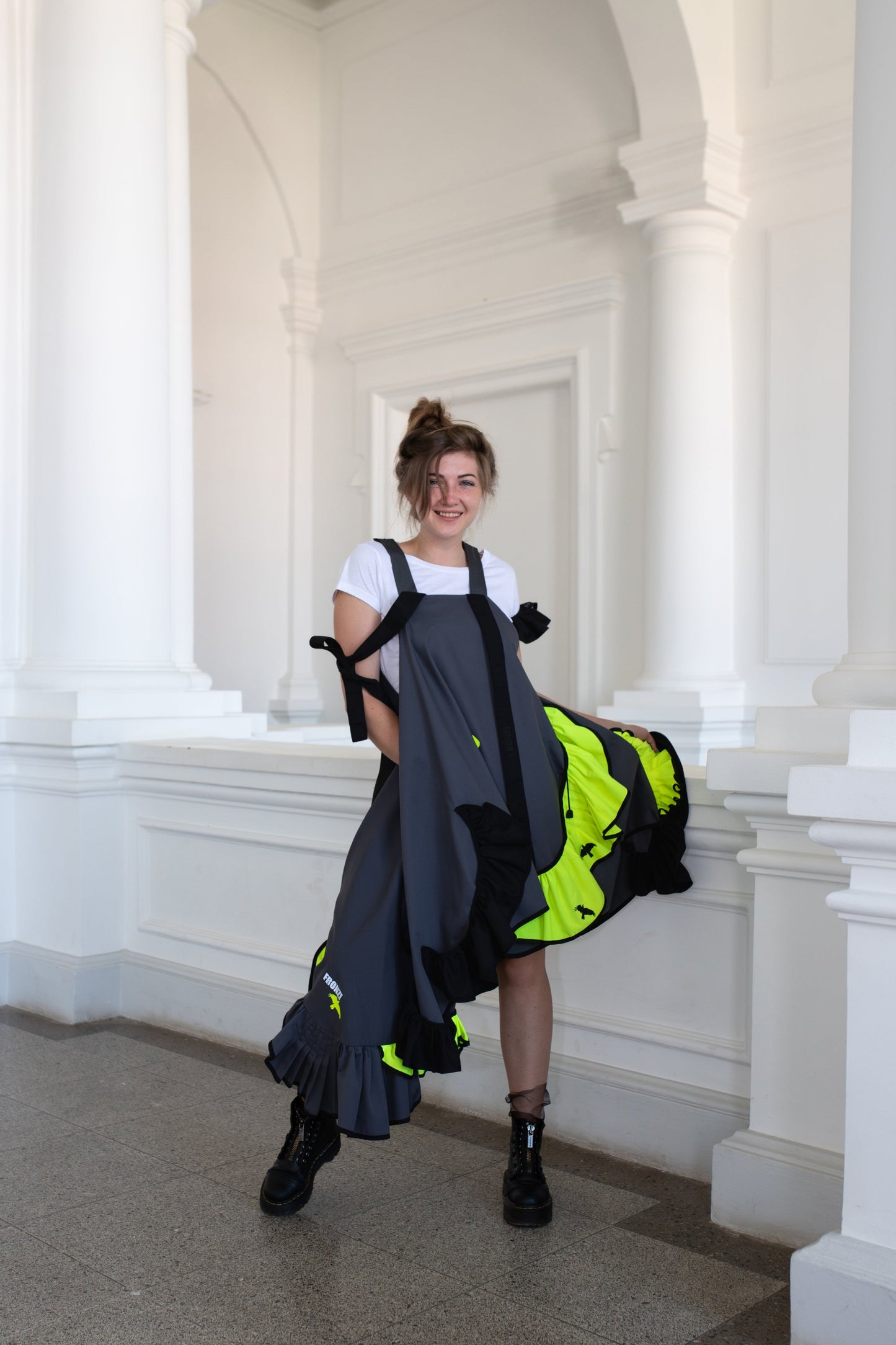 Grey fronzi dress with neon and black details and frills