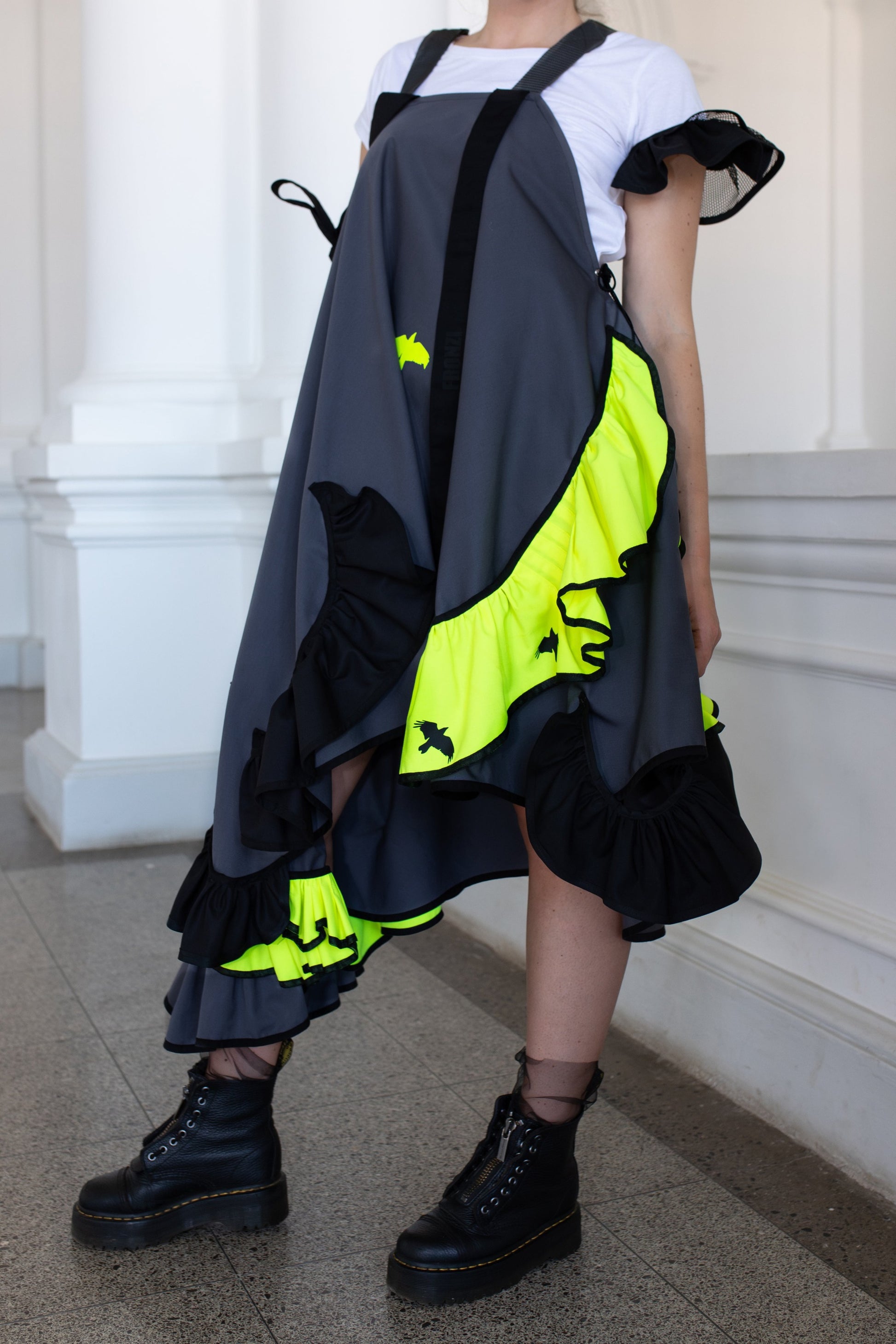 Grey fronzi dress with neon and black details and frills