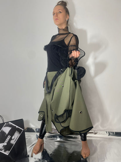 Model wearing a khaki skirt which can also be converted to a dress