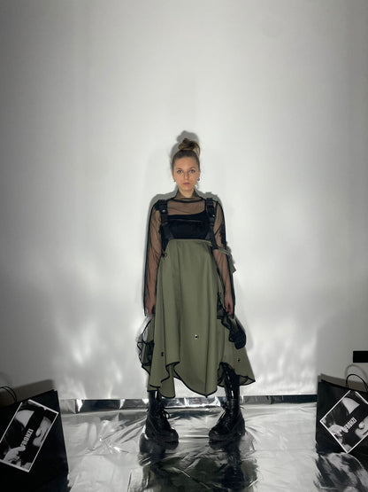 View from the front of model wearing a khaki color dress